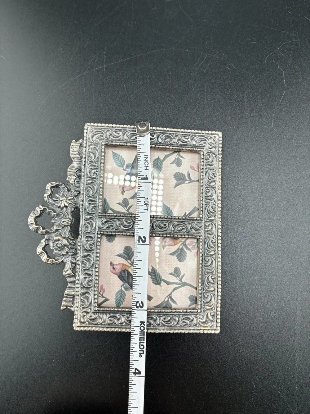 Ornate pewter Double‎ Photo Frame with floral bow on top